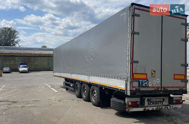 Тентований борт (штора) - напівпричіп Schmitz SCS 24 2005 в 