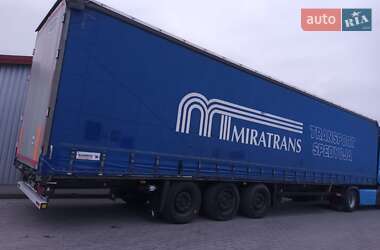 Бортовой полуприцеп Schmitz SCS L24 2010 в 