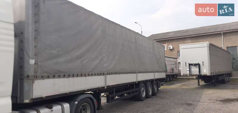 Бортовий напівпричіп Schwarzmuller J-Serie 2012 в Мукачевому