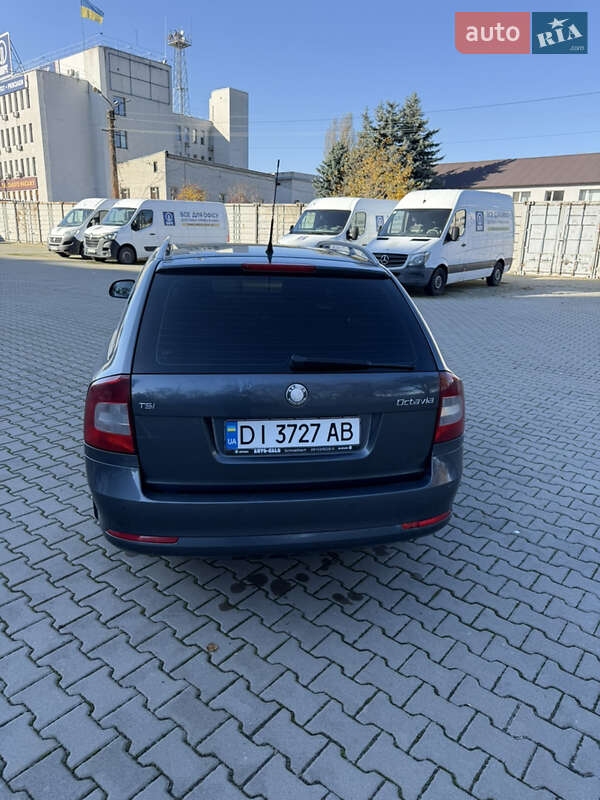 Универсал Skoda Octavia 2010 в Вишневом фото 8 Универсал Skoda Octavia 2010 в Вишневом