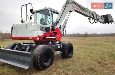 Колесный экскаватор Takeuchi TB 2008 в 