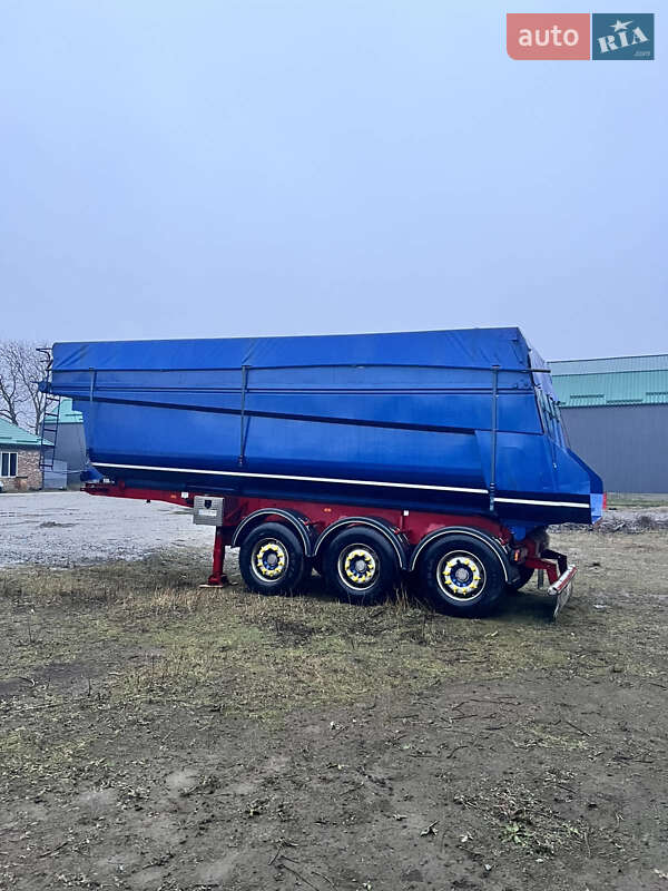 Бортовий напівпричіп Tecnokar T3-SP38 2003 в Умані