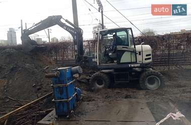 Колесный экскаватор Terex TW 2009 в 