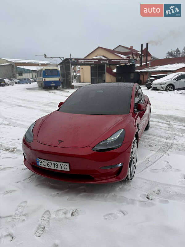 2022 Tesla Model 3, VIN 5YJ3E1EB7NF204303:plate — фото 1 (autoria)