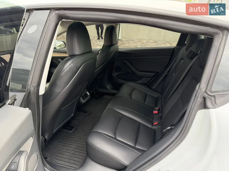 Tesla Model 3 2023 VIN 5YJ3E1EC8PF661536 фото оголошення 8 з 31
