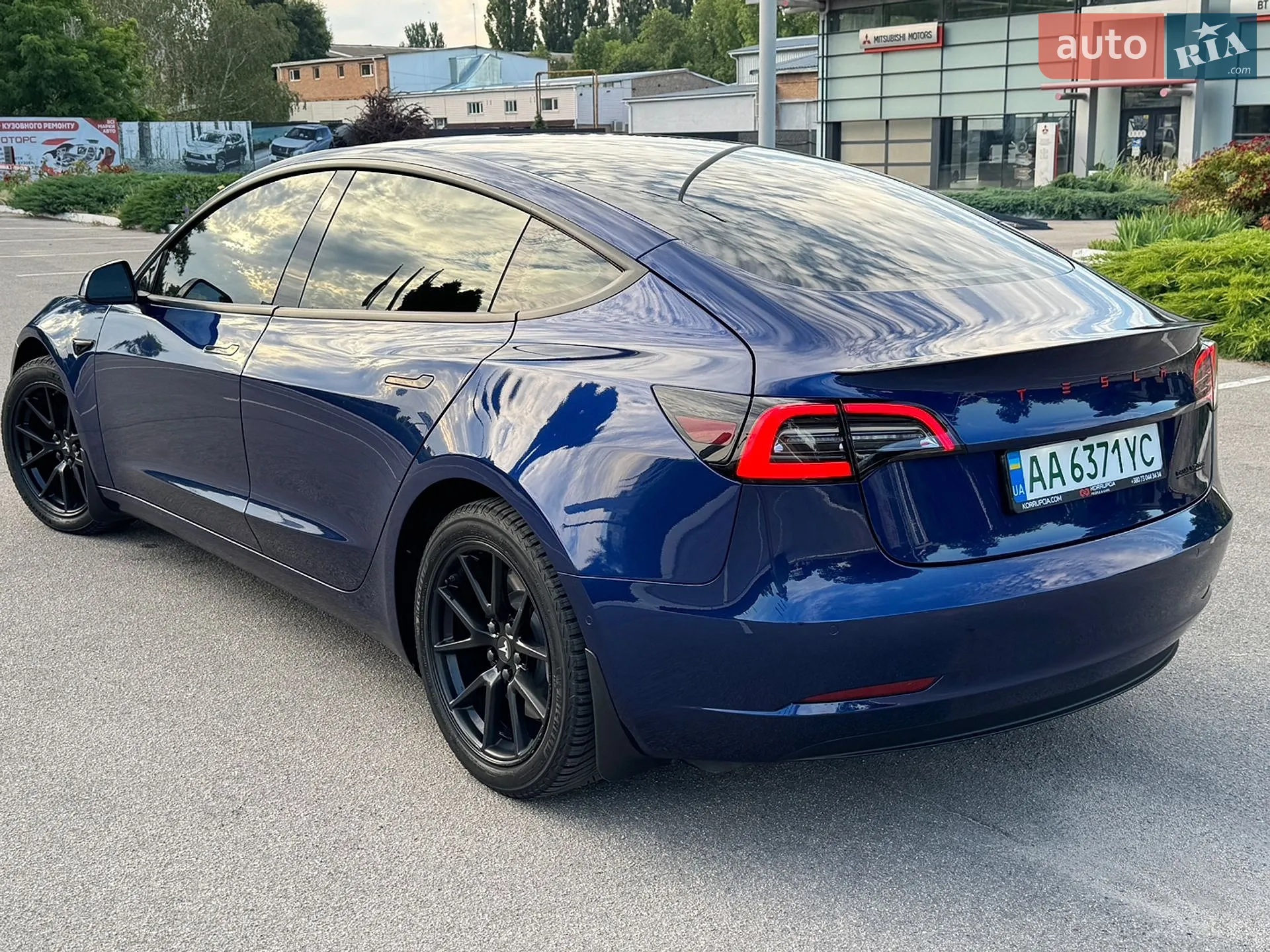 Tesla Model 3 2022 VIN 5YJ3E1EB1NF335677 фото оголошення 4 з 45