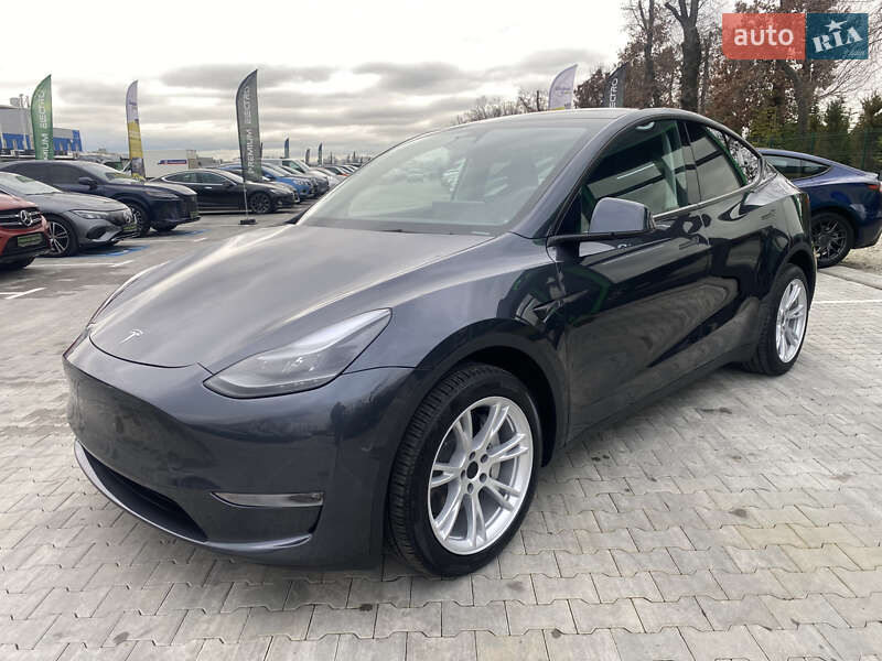 2024 Tesla Model Y, VIN 7SAYGDEEXRA283726:plate — фото 1 (autoria)