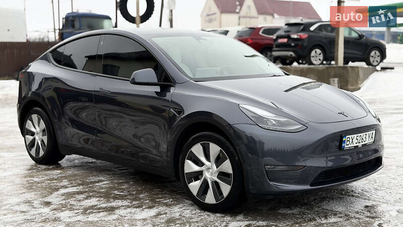 2023 Tesla Model Y, VIN 7SAYGAEE4PF833503:plate — фото 1 (autoria)