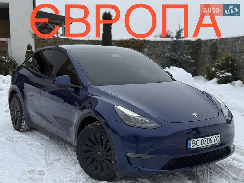 2023 Tesla Model-Y, VIN LRWYGCEK2PC674568:plate — фото 1 (autoria)