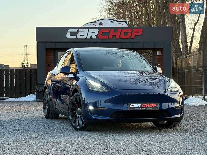 2024 Tesla Model Y, VIN 7SAYGDEF6RA268195:plate — фото 1 (autoria)