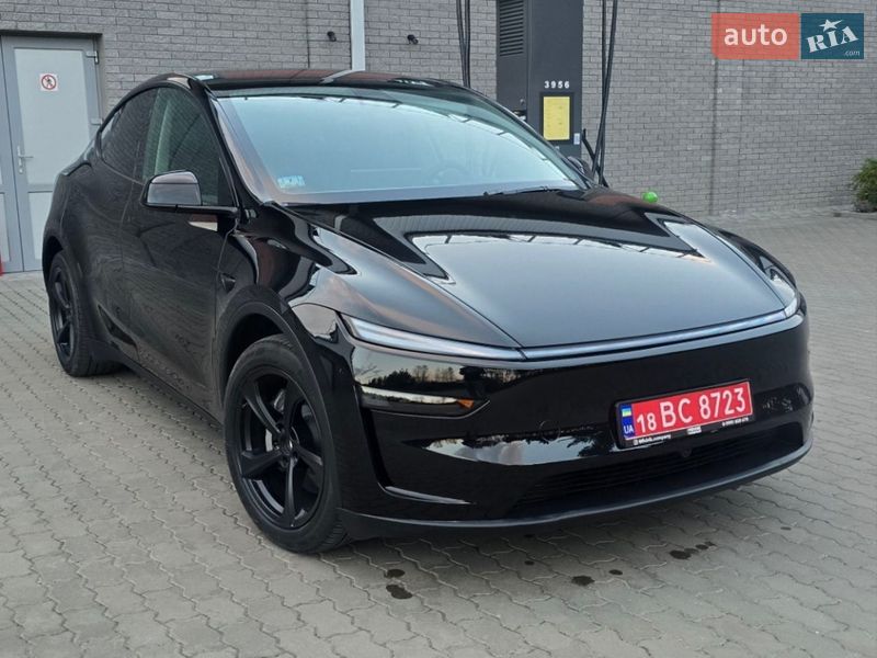 2026 Tesla Model Y, VIN 7SAYGDEE5TA439288:plate — photo 1 (autoria)