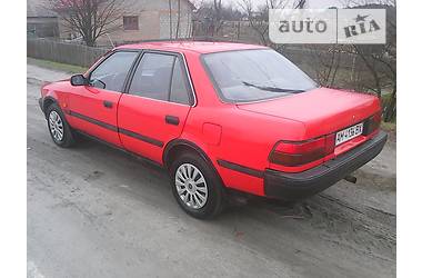 Седан Toyota Carina 1991 в Полонному