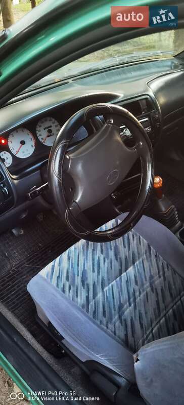 Хетчбек Toyota Corolla 1997 в Турбовом фото 16 Хетчбек Toyota Corolla 1997 в Турбовом