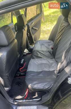 Хэтчбек Volkswagen Golf 2002 в 