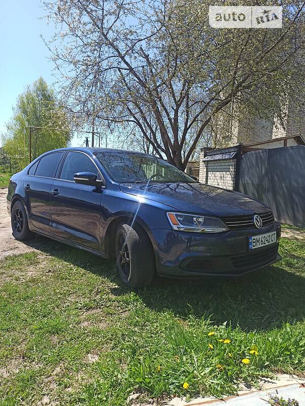 Седан Volkswagen Jetta 2014 в Ромнах