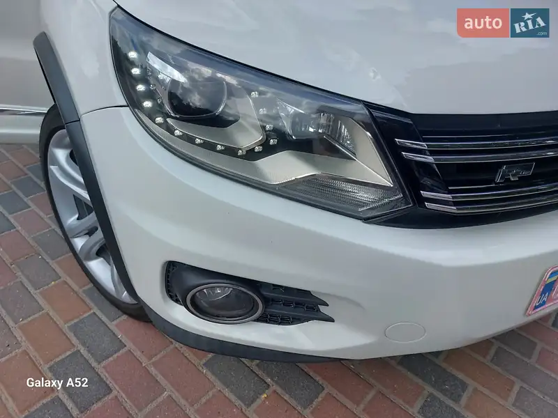 Volkswagen Tiguan 2013 VIN WVGAV3AX1EW038579 фото оголошення 4 з 73