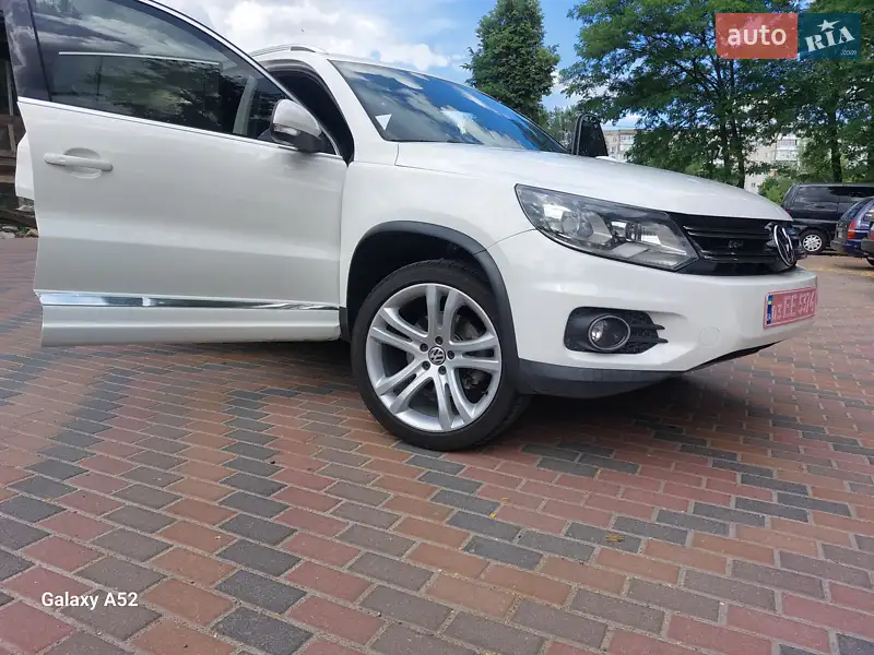 Volkswagen Tiguan 2013 VIN WVGAV3AX1EW038579 фото оголошення 23 з 73