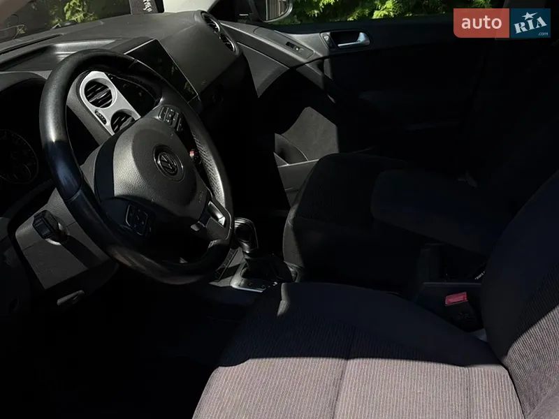 Volkswagen Tiguan 2013 VIN WVGBV3AX9EW541104 фото оголошення 11 з 77