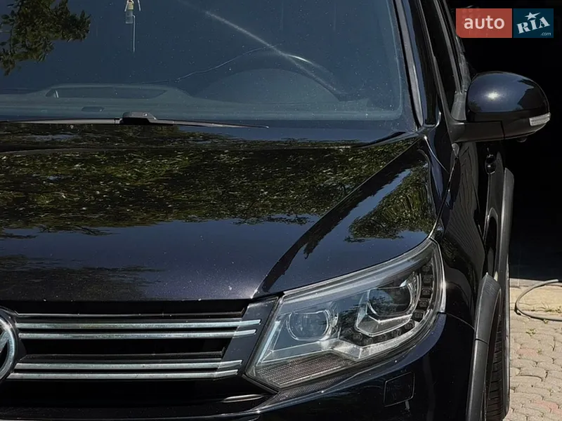 Volkswagen Tiguan 2013 VIN WVGBV3AX9EW541104 фото оголошення 8 з 77