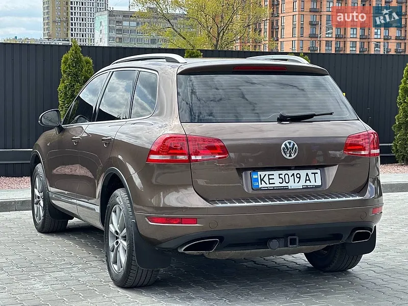 Volkswagen Touareg 2012 VIN WVGZZZ7PZCD047407 фото оголошення 9 з 100
