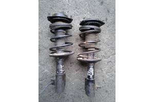 передня стойка mazda323 1988год передня стойка mazda323 1988год