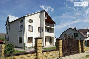 Продается дом на 2 этажа 233 кв. м с гаражом