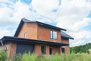 Продается дом на 2 этажа 200 кв. м с гаражом