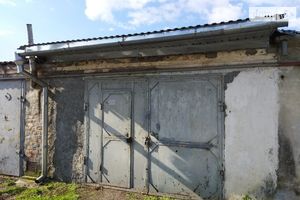 Продается место в гаражном кооперативе под легковое авто на 25.7 кв. м