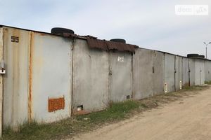 Продается место в гаражном кооперативе под легковое авто на 12 кв. м